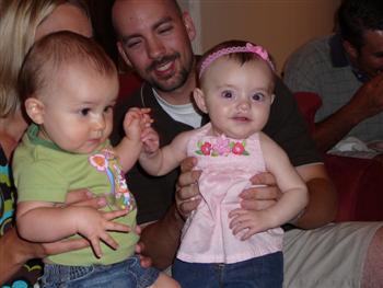 Gabby holding hands with her new best friend, Cousin Cecelia